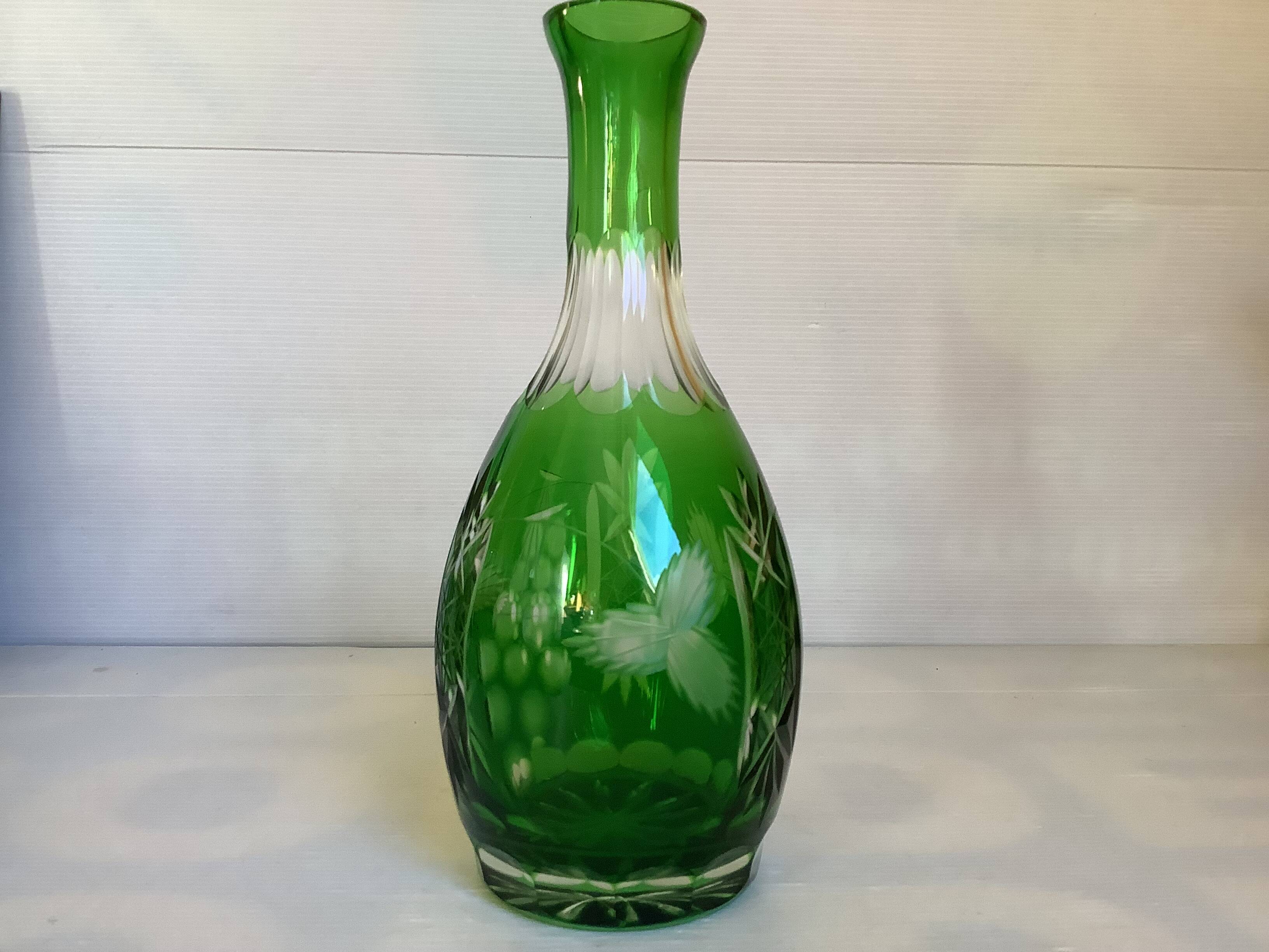 Green cut crystal bottle