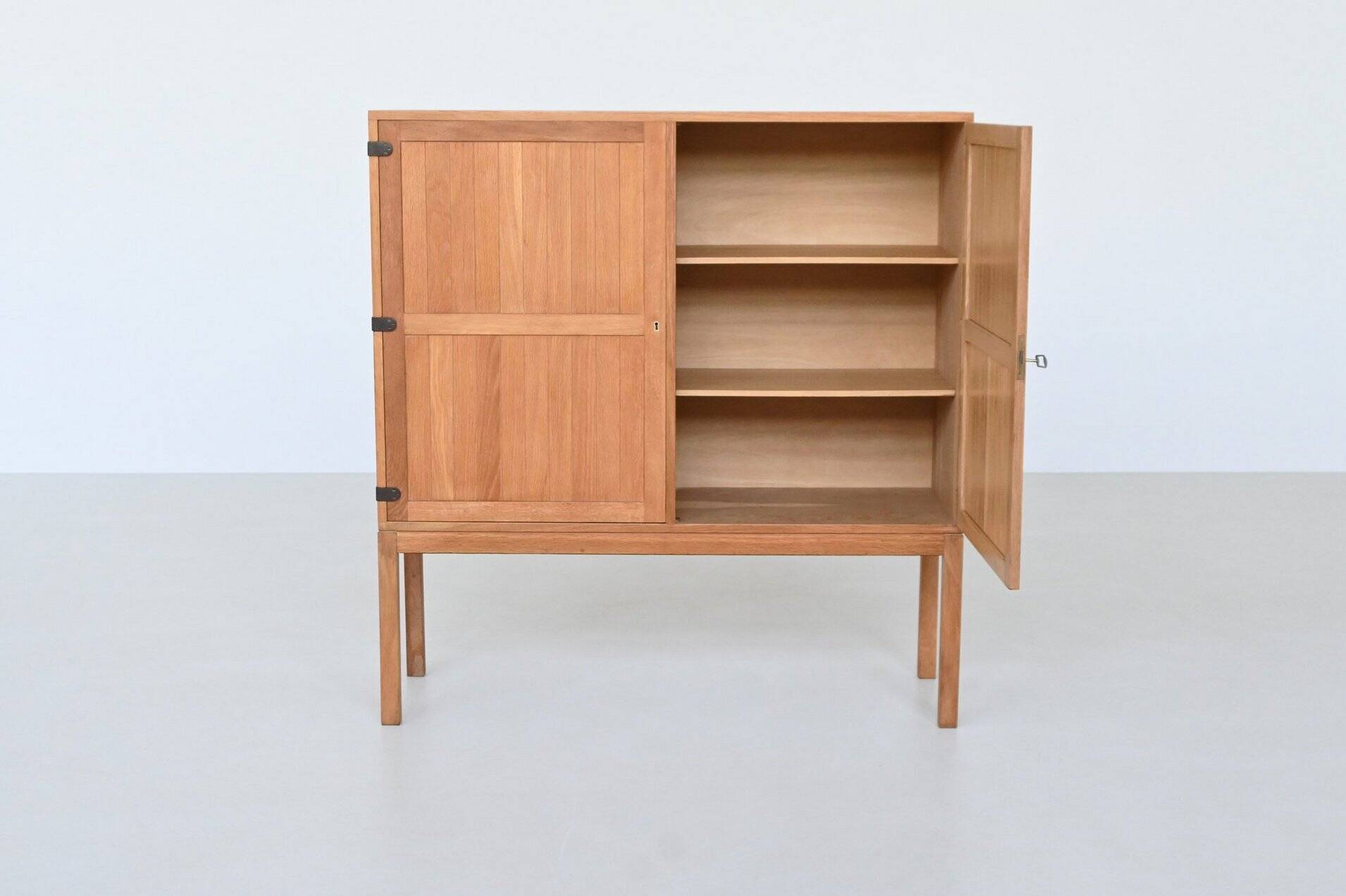 Kurt Ostervig high cabinet in oak A/S Randers Denmark 1960