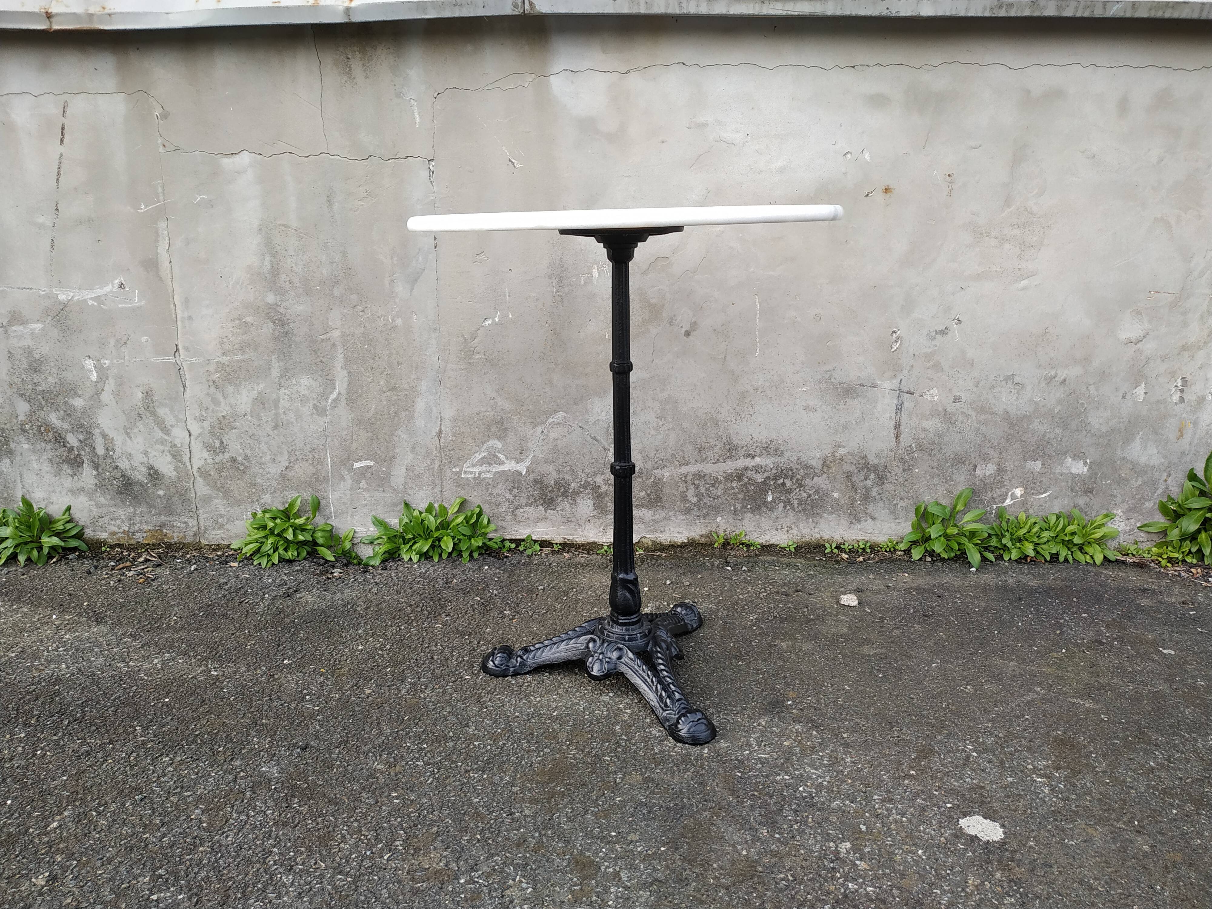 Cast and marble bistro table