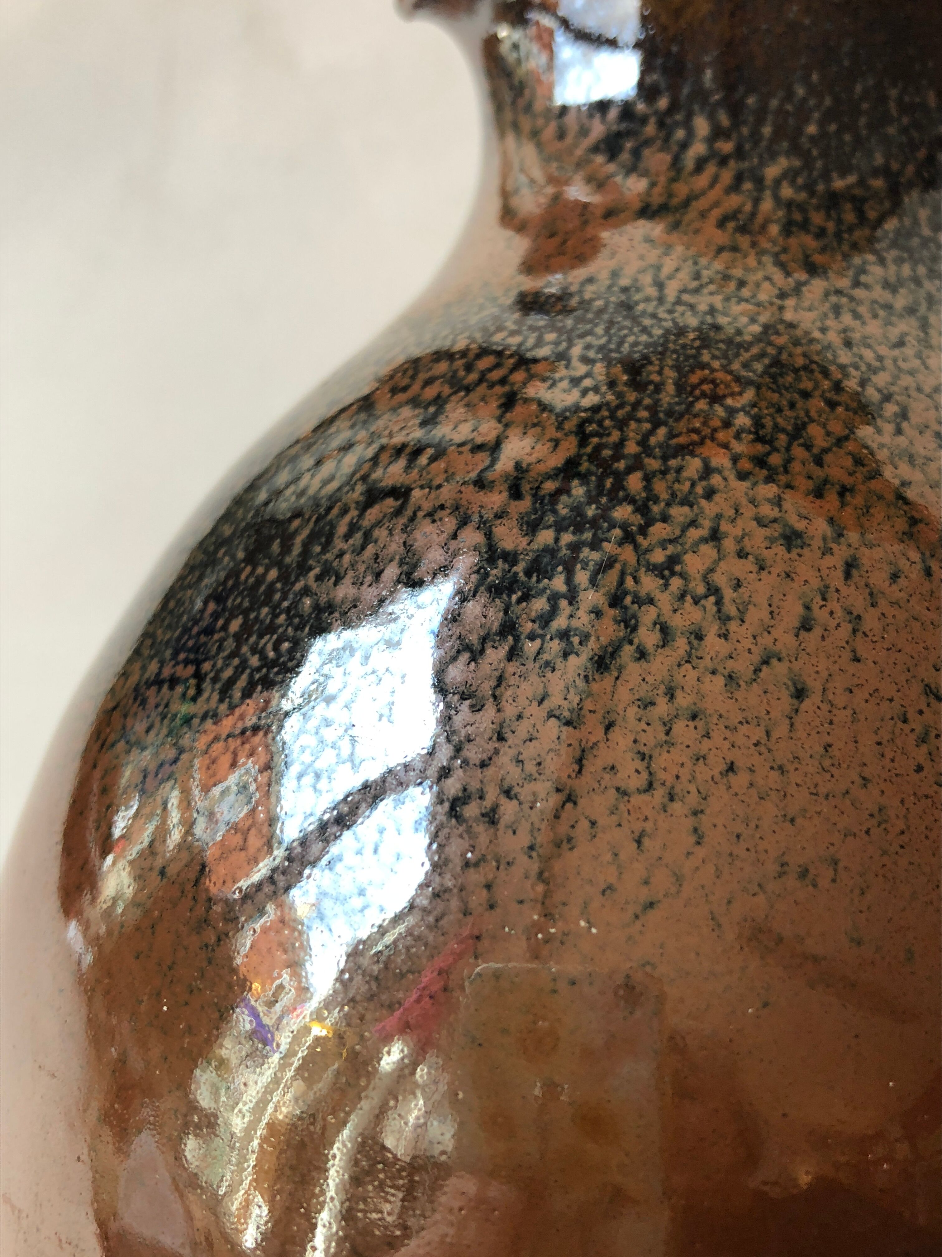 Glazed stoneware jug signed "KD".