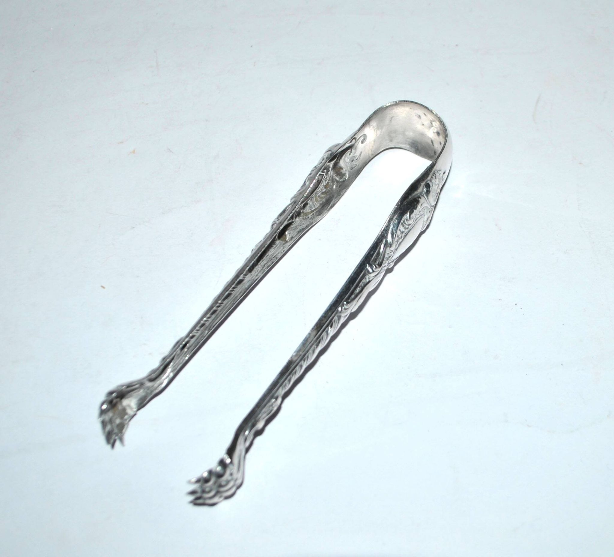 Pince à sucre Rocaille en métal argenté