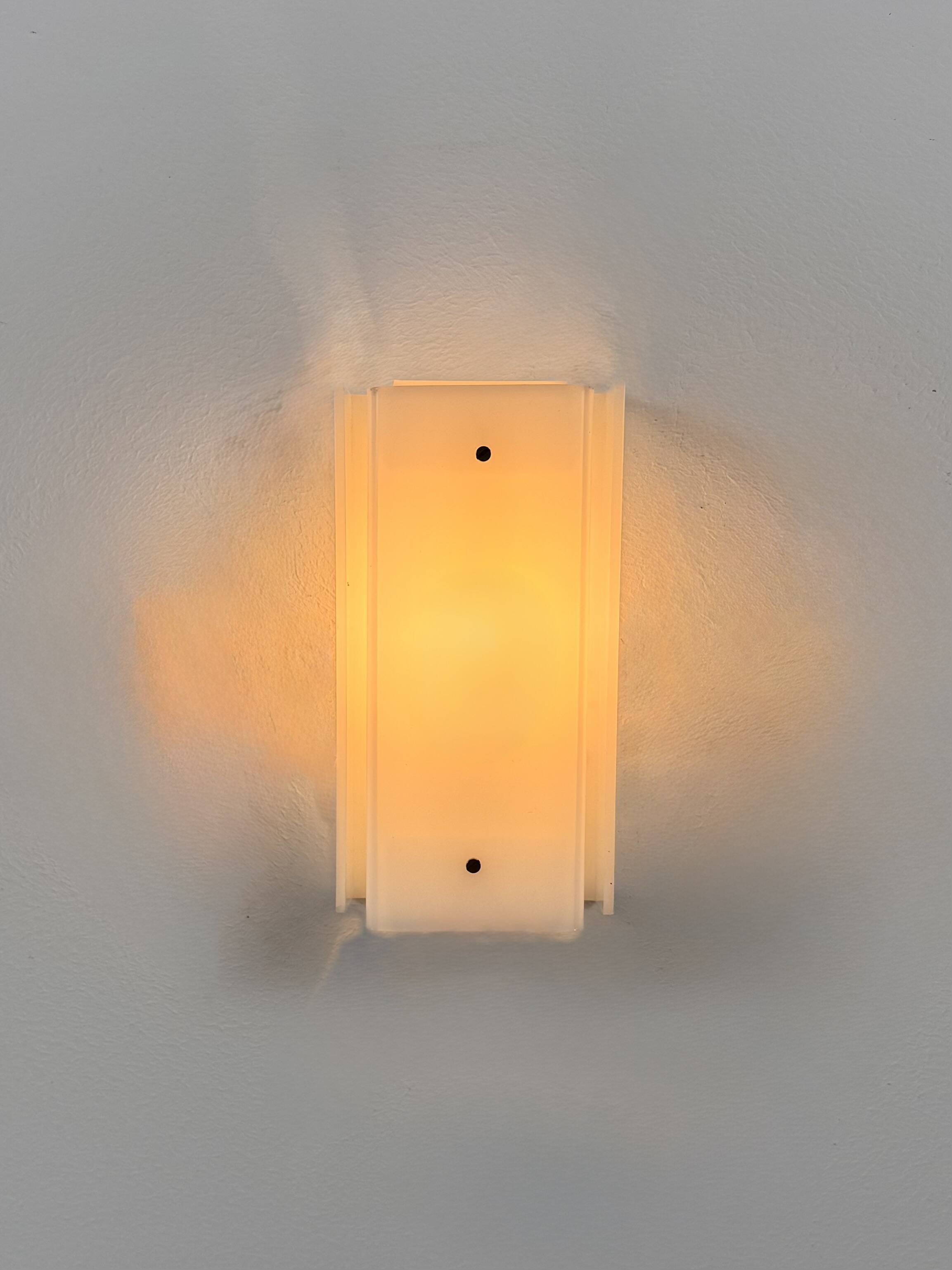 Pair of vintage Perspex wall lights, Italy, 1970.