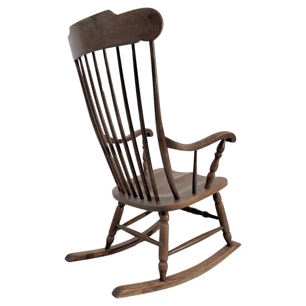 Vintage rocking chair in oak by Den Ouden, The Netherlands, 1975.