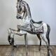 Carved and patinated wooden carousel horse