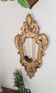 Mirror carved in gilded wood, 19th century