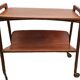 Rolling magazine rack in opal teak by Kleinmobel, 1960