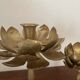 Set of two old brass lotus flower candlesticks