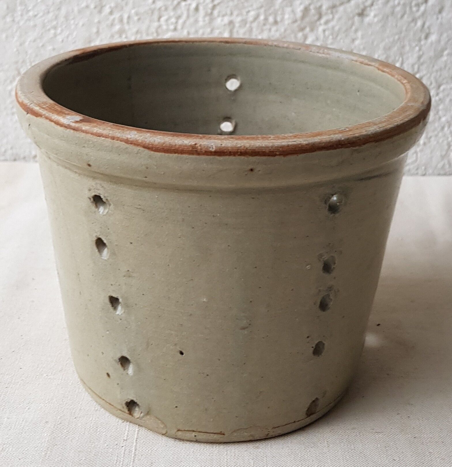 Pot with pheasant in earth