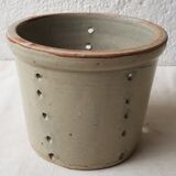 Pot with pheasant in earth