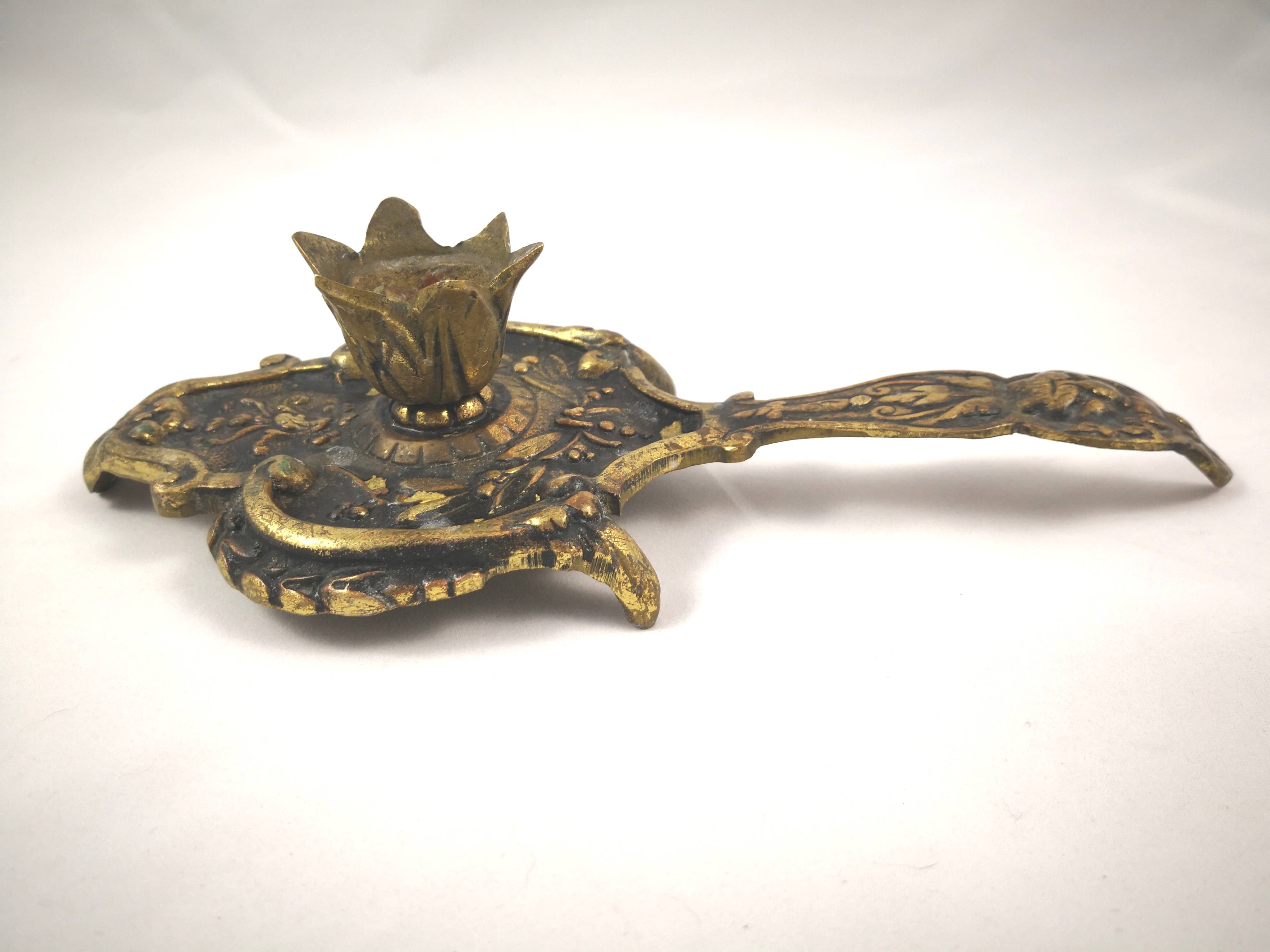 bronze or brass candle holder, cellar level
