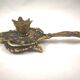 bronze or brass candle holder, cellar level