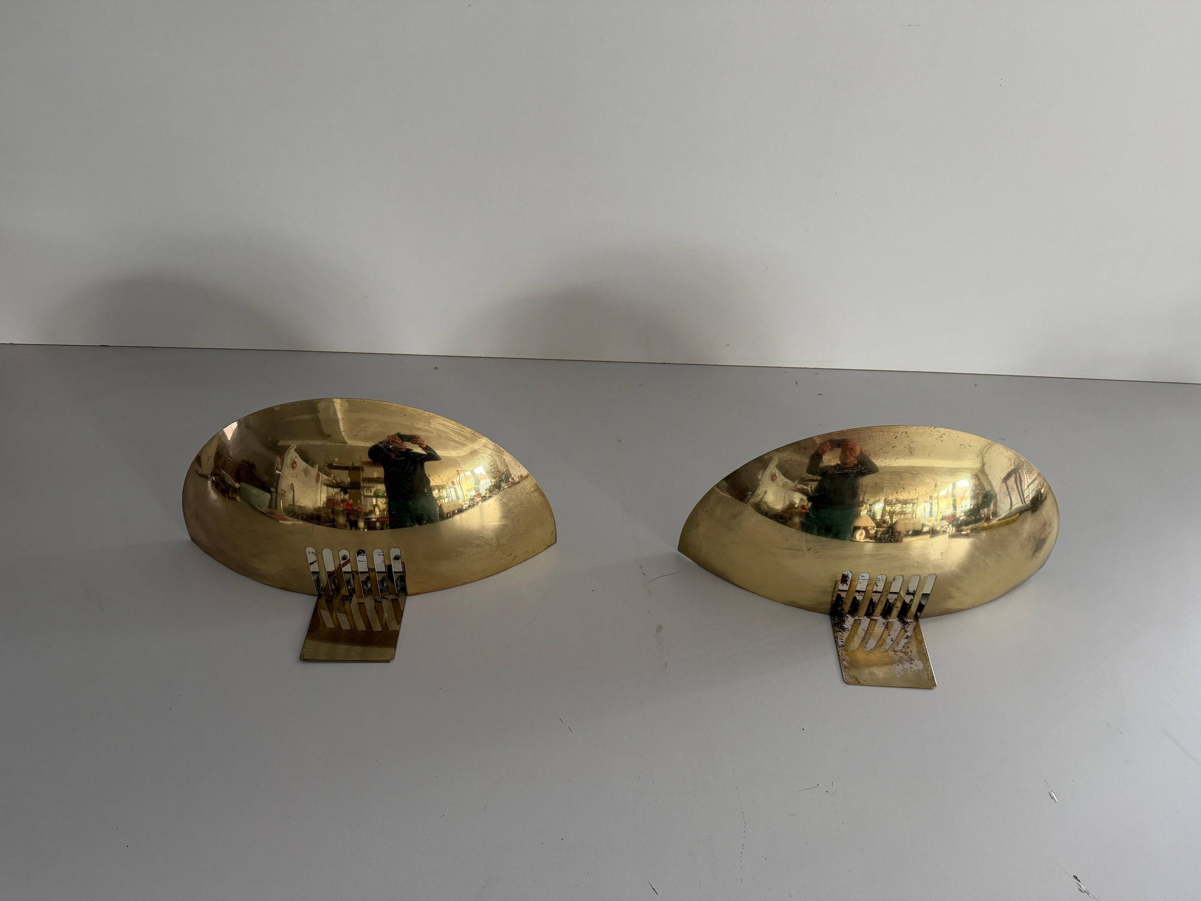 Pair of brass wall sconces from the mid-century by SCE, 1960s, France.