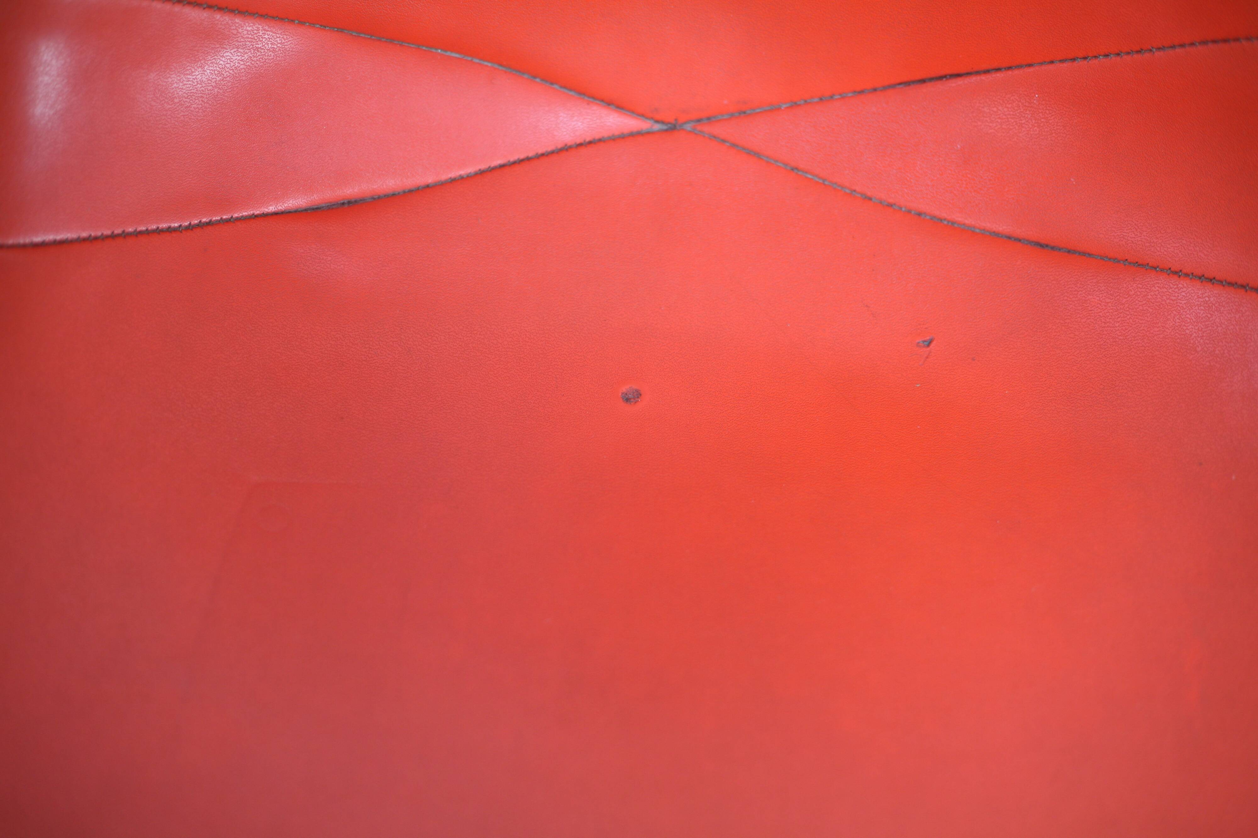 Ray & Charles Eames, Herman Miller edition, set of 4 orange chairs. Circa 1960