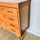 Commode en marqueterie de bois et pieds compas