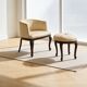 An antique Italian bar chair and a matching tufted vanity stool.