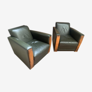 Pair of leather armchairs by Hughes Chevalier