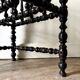 Napoleon III magazine rack in black turned wood