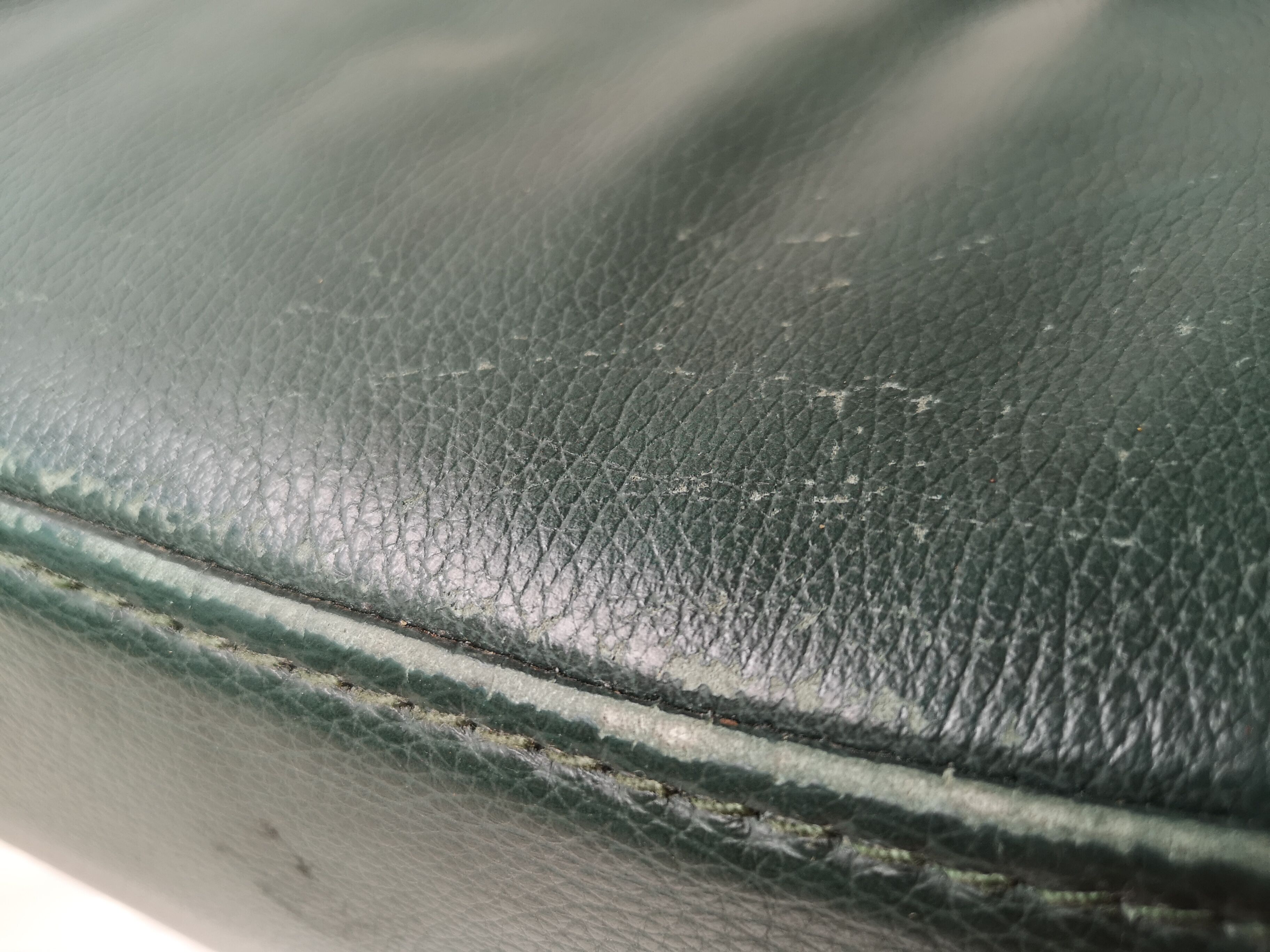 Mid - century leather armchair with footrest with relax function from himolla