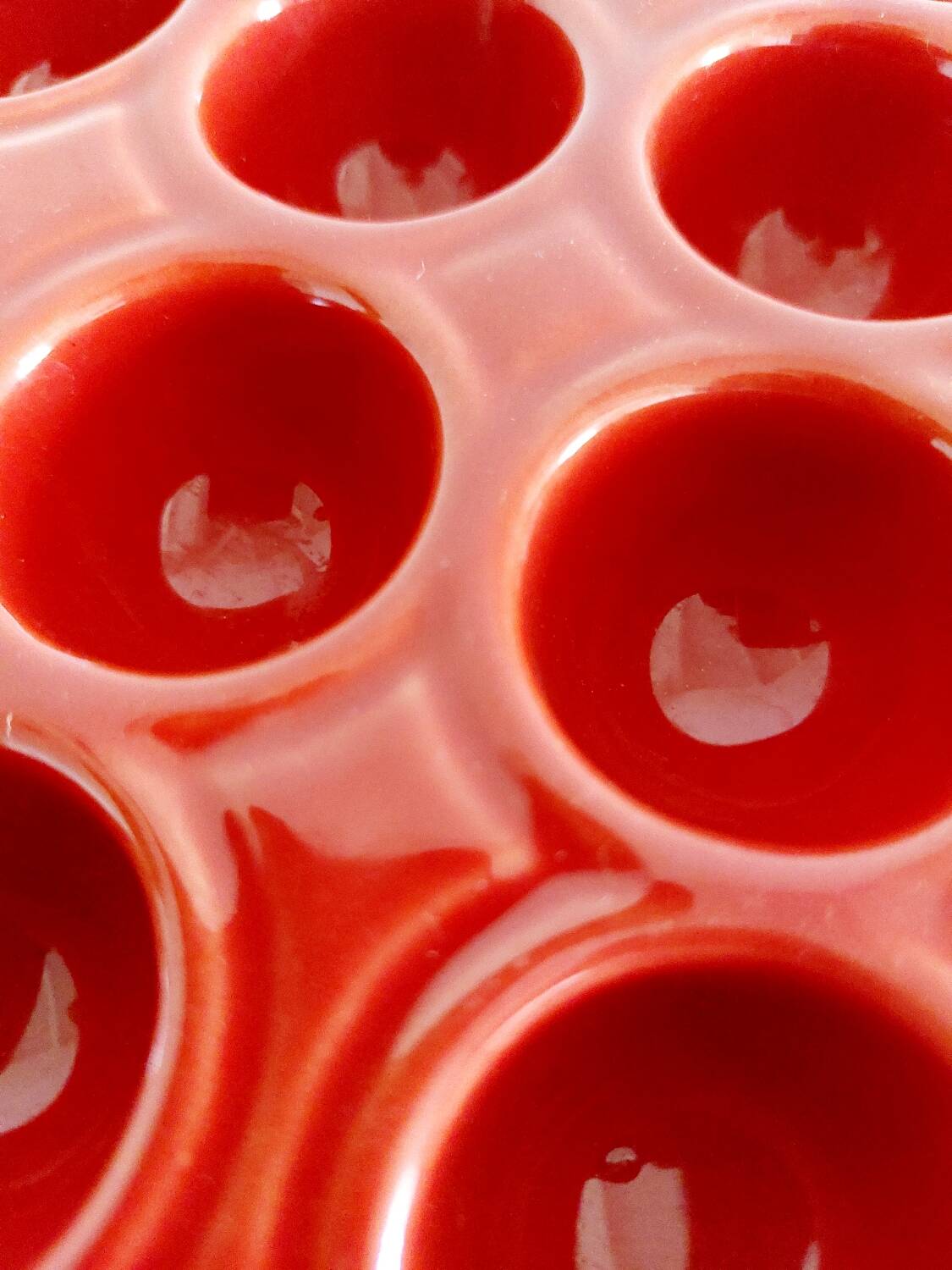 Red ceramic snail dishes