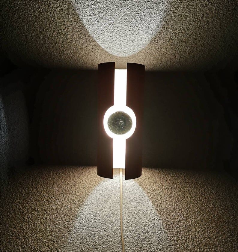 Raak Amsterdam orange wall applique from the 1970s