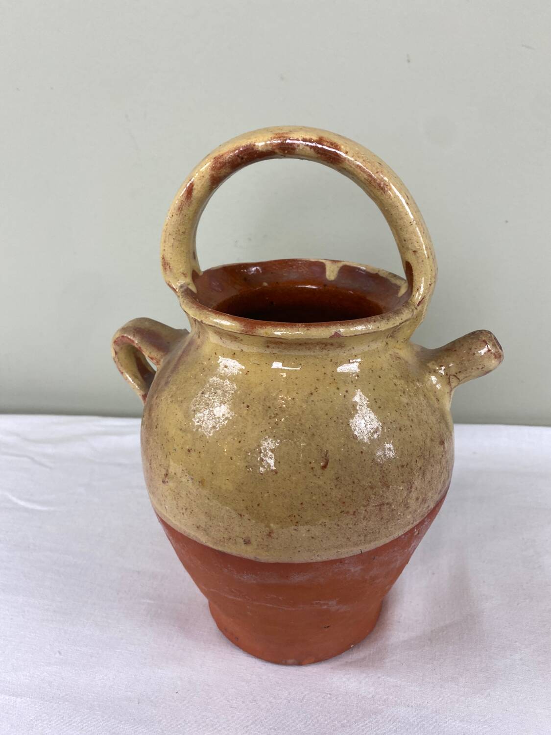 Glazed terracotta jug