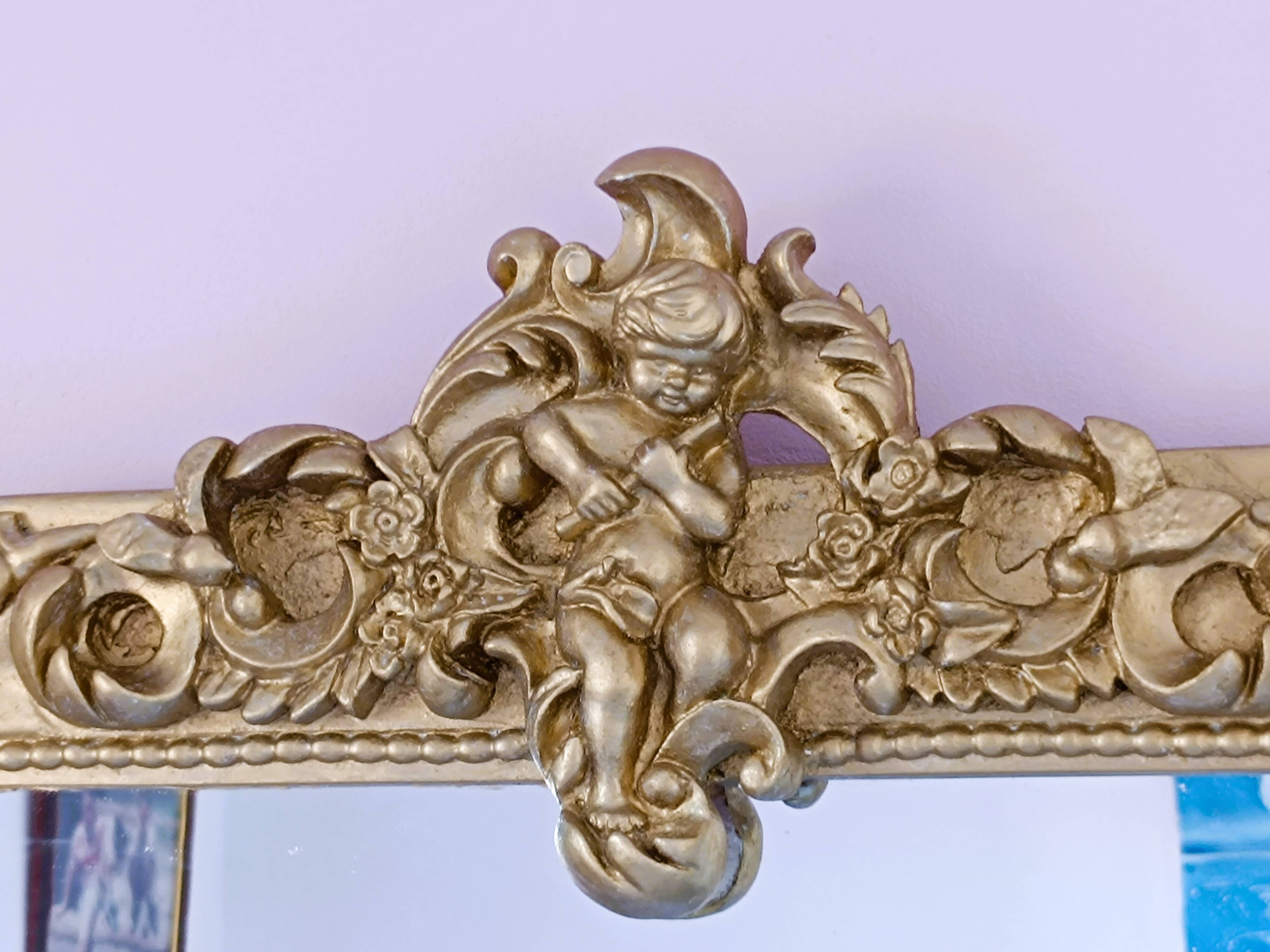 Gilded mirror with a Louis Philippe style pediment