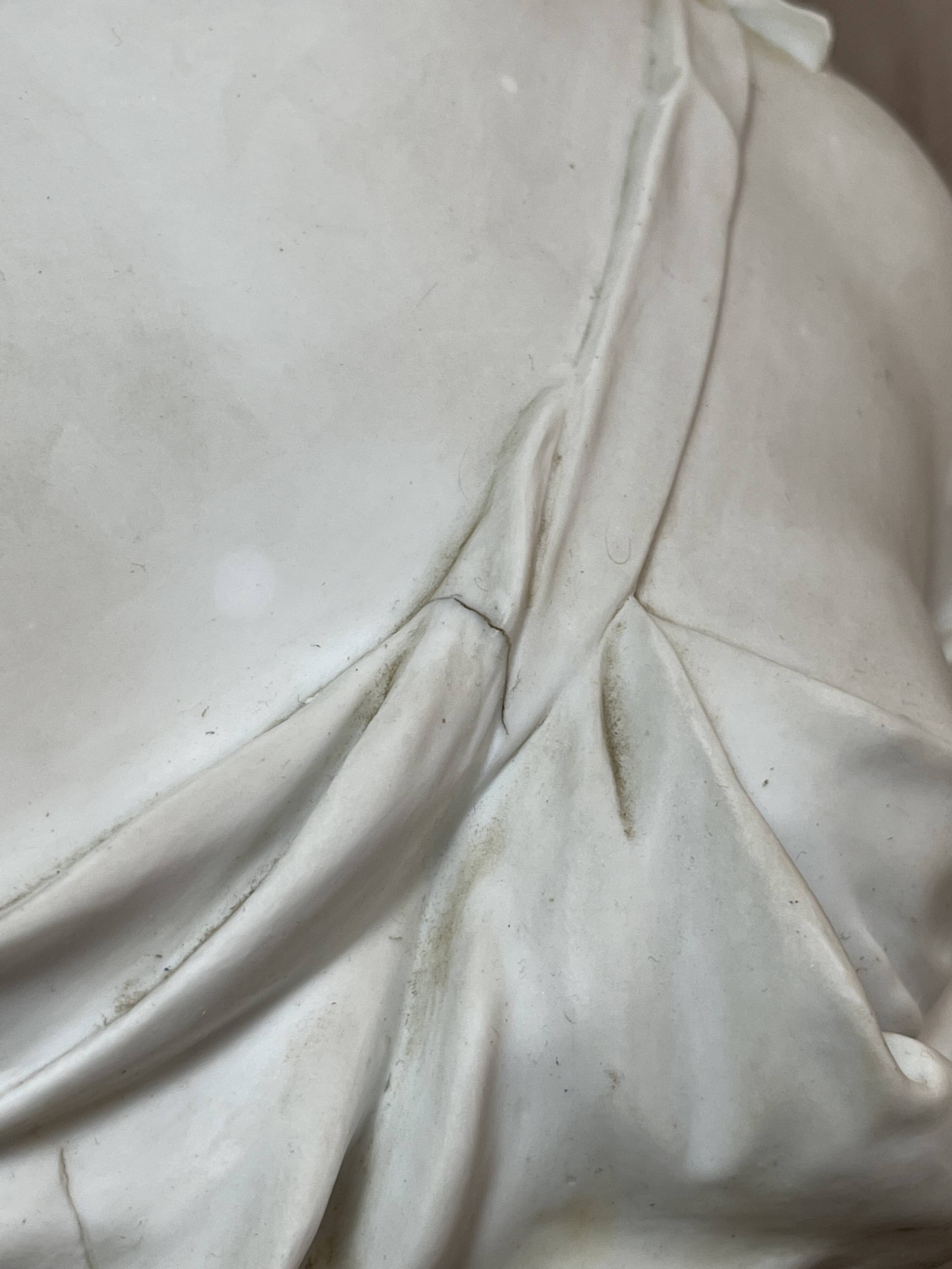 Bust of a woman in Biscuit signed