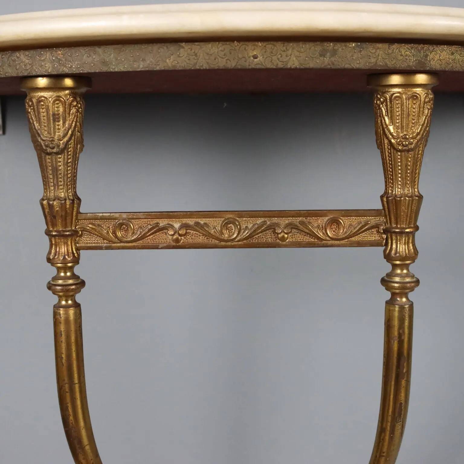 Old neoclassical consoles in gilded bronze from the 20th century.