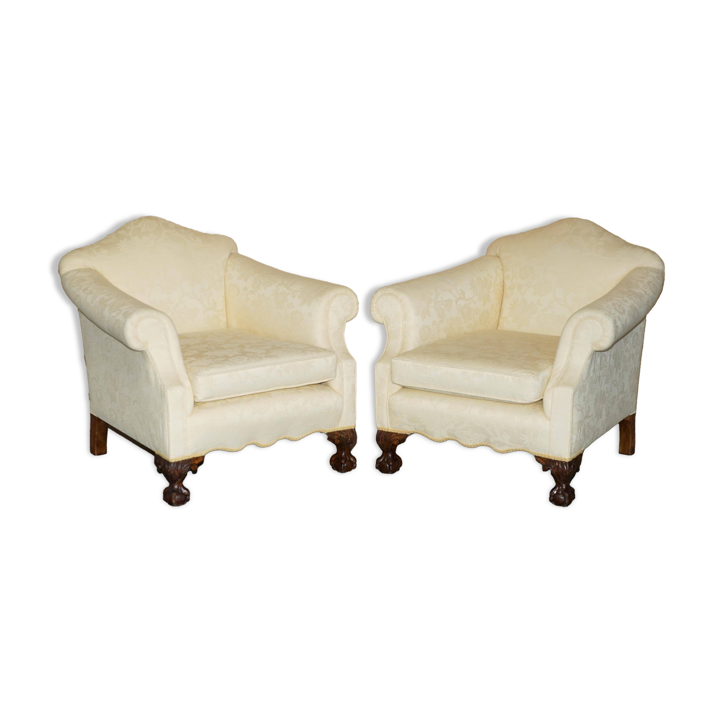 Pair of Edwardian armchairs from 1910 with carved legs and fabric.