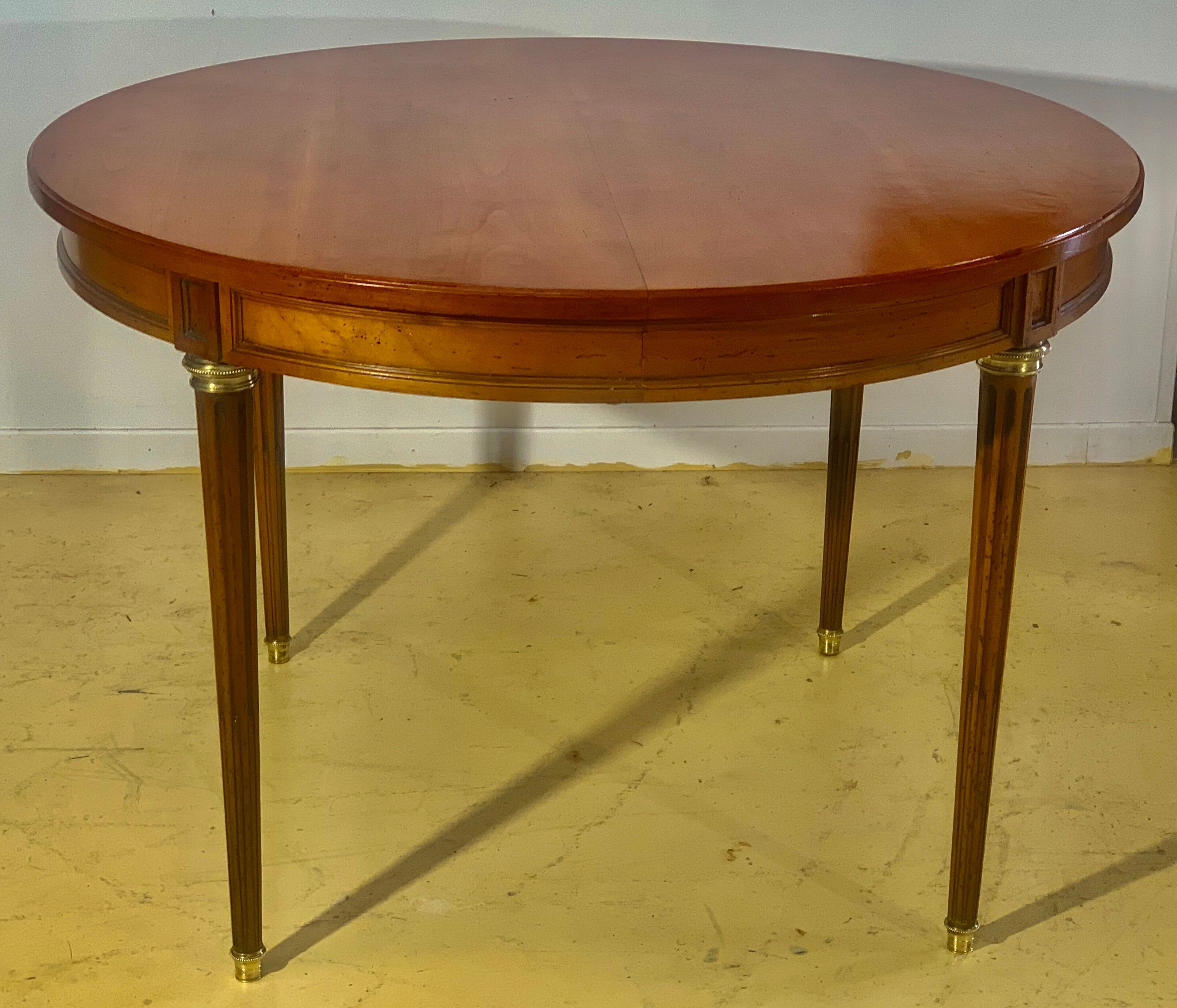 Louis XVI style table in cherry with 2 extensions