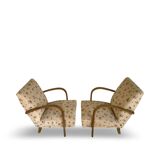 Ensemble de fauteuils Art Déco avec accoudoirs en hêtre arqués.