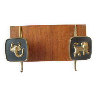 Old coat rack with 2 hooks from the 1950s astro sign Lion Scorpio in bronze