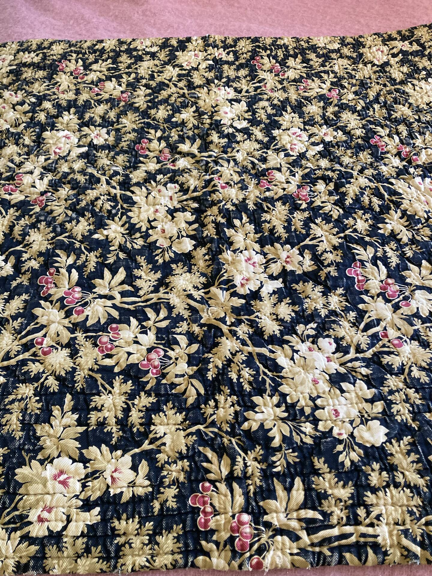 Antique hand-stitched boutis bedspread, floral fabric, 19th century.
