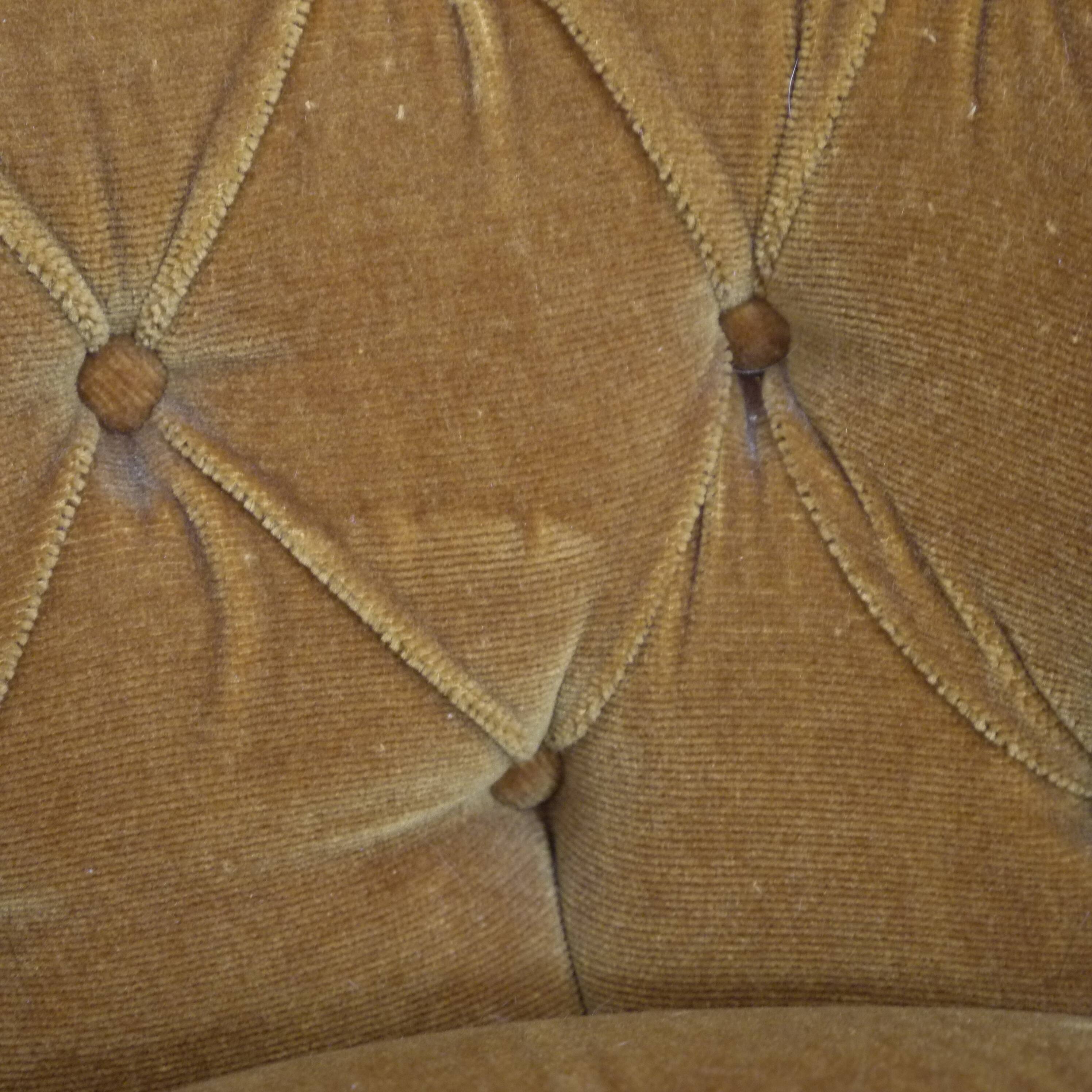 Yellow velvet padded toad armchair
