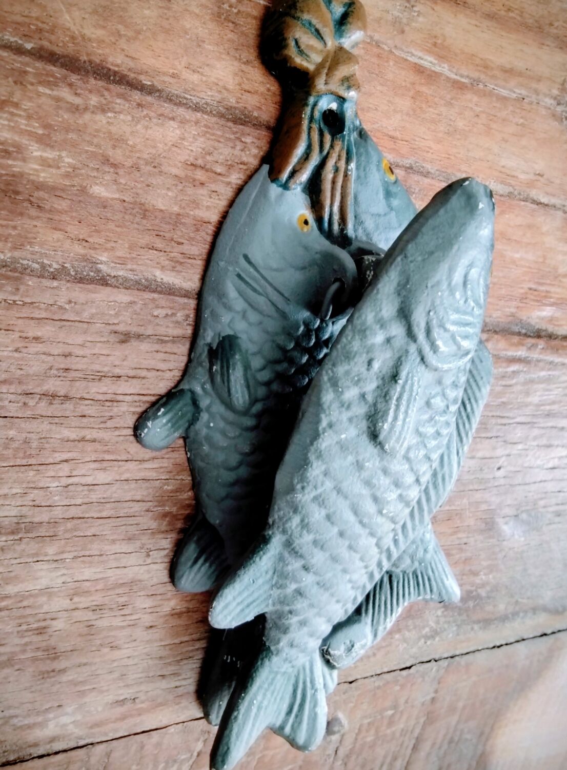 Heurtoir en fonte trio de poissons