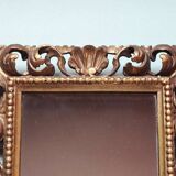 Miroir en bois sculpté et doré
