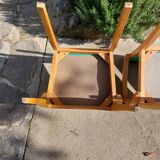 3 vintage bridge chairs with rounded armrests.