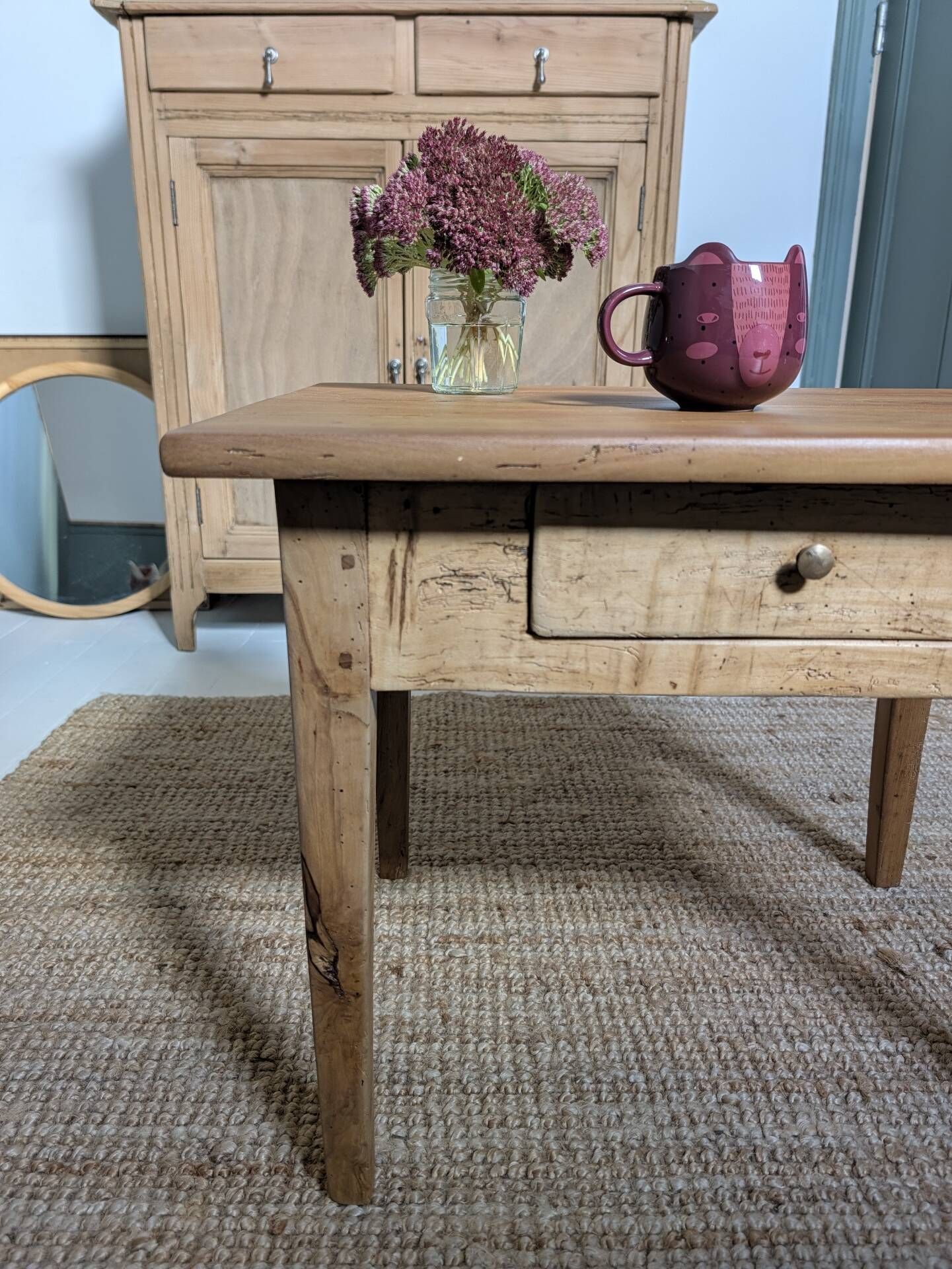 Small antique wooden coffee table with drawer, country style.