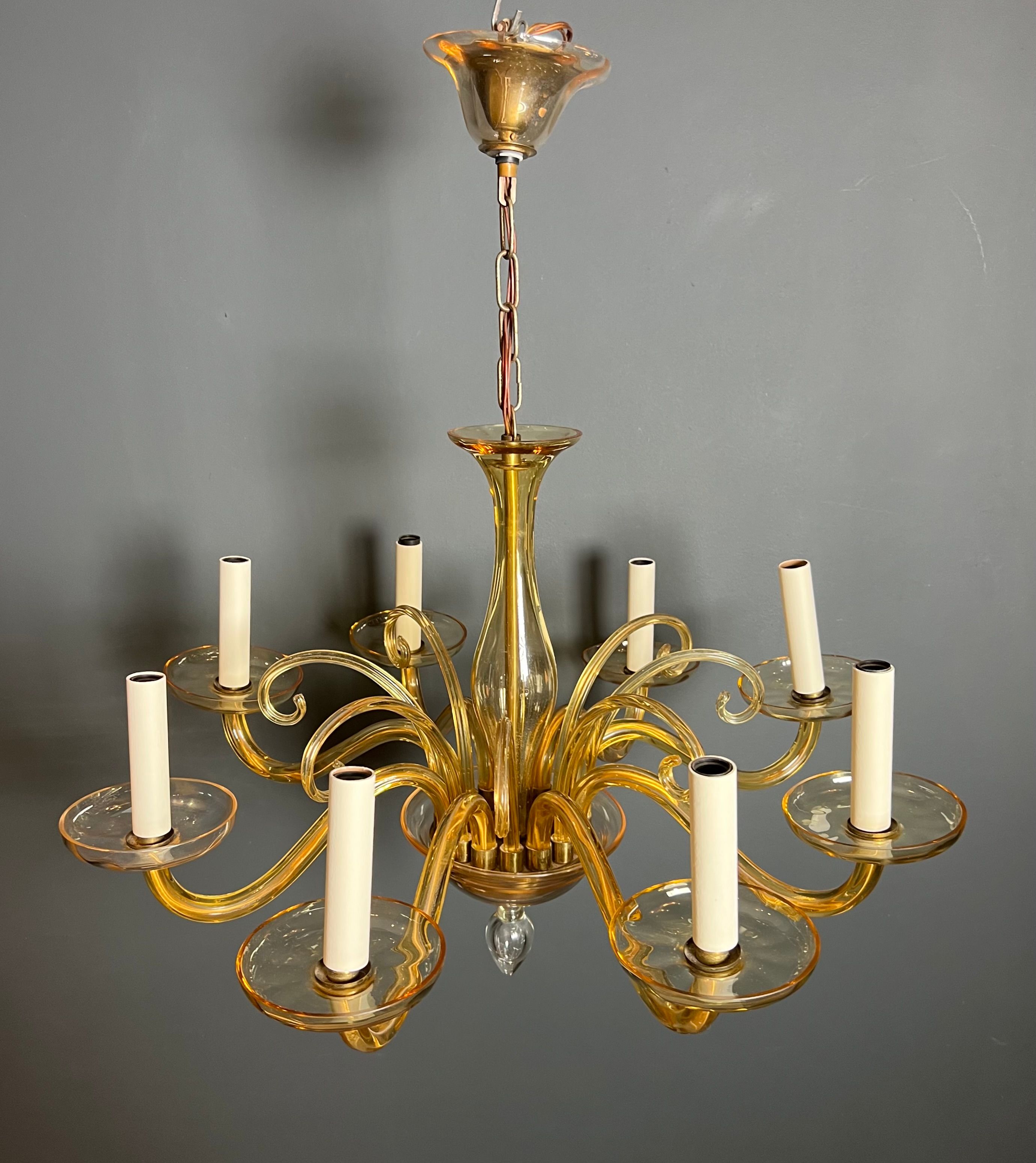 Orange Murano crystal chandelier with 8 light arms. Italian work. Circa 1970.
