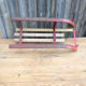 Luge rouge en métal et bois des années 60