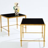 Pair of side tables in gilded iron and black lacquer Maison Ramsay 1950