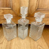 Set of 3 vintage whisky carafe bottles in molded glass