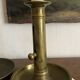 Gold-plated brass push-button candle holder