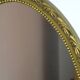 miroir médaillon doré style Louis XVI, 63x41 cm