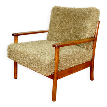 Wooden vintage brown armchair, olive green, long pile on removable cushions
