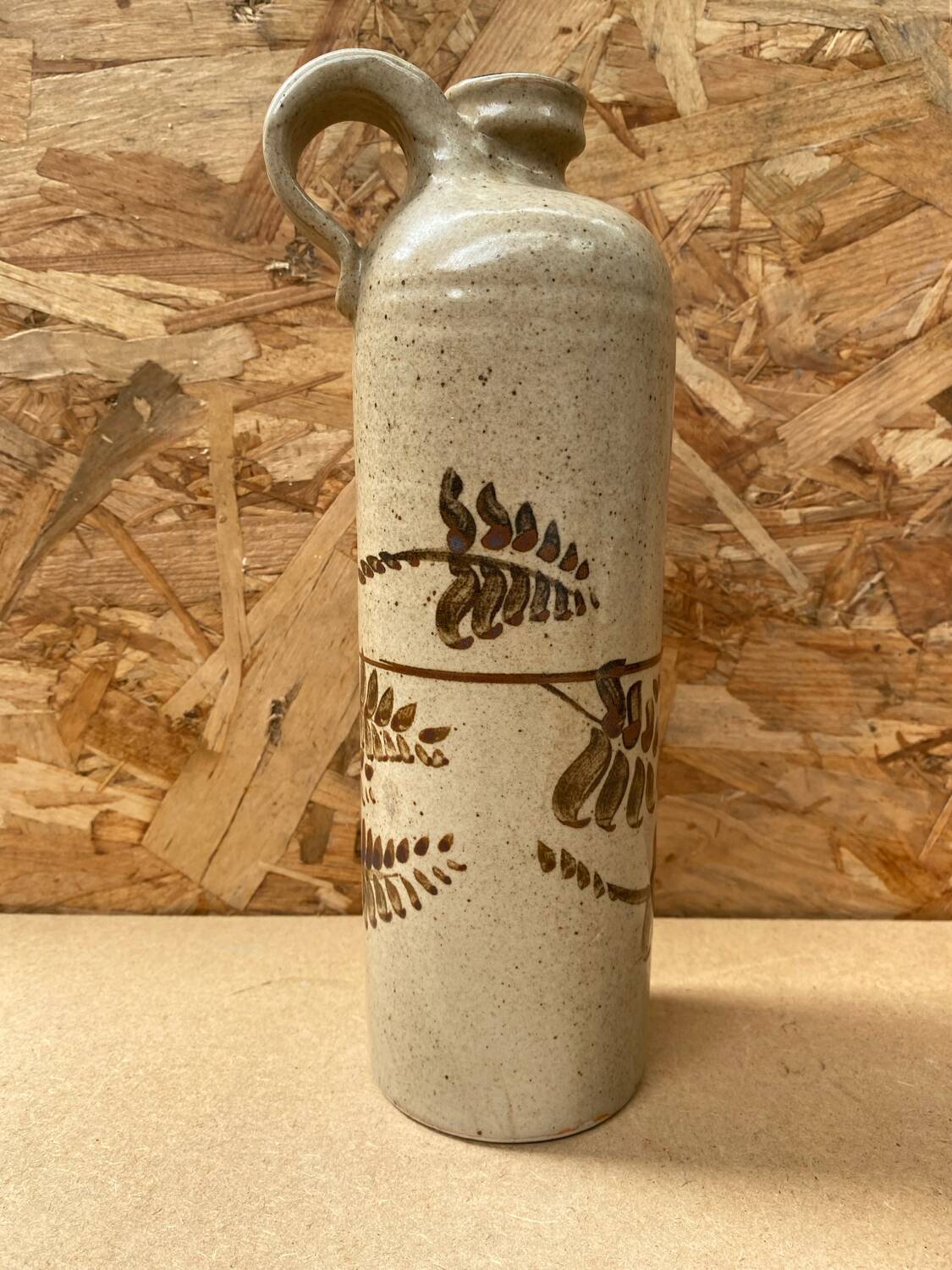 Antique beige enameled ceramic bottle vintage leaf decor