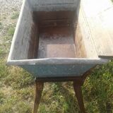 Old galvanized wash on foot