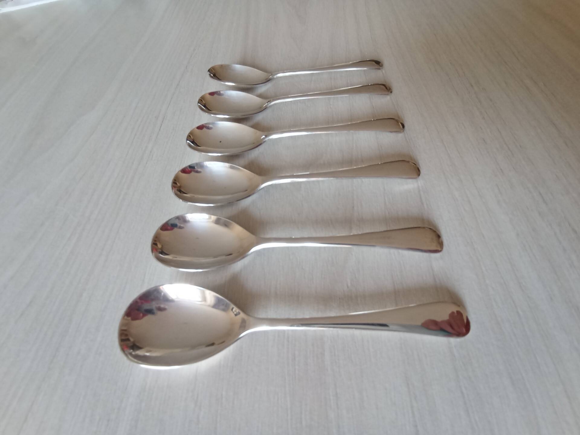 Set of 6 small silver metal spoons