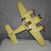Old metal Joustra toy; propeller aircraft with its pilot friction mechanism