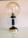 Structured amber glass globe lamp on black and brass base by Solken Leuchten/ 60s-70s